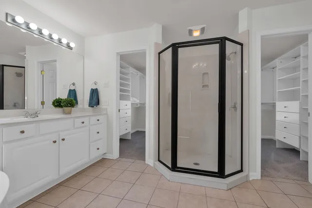 a view of utility room and bedroom