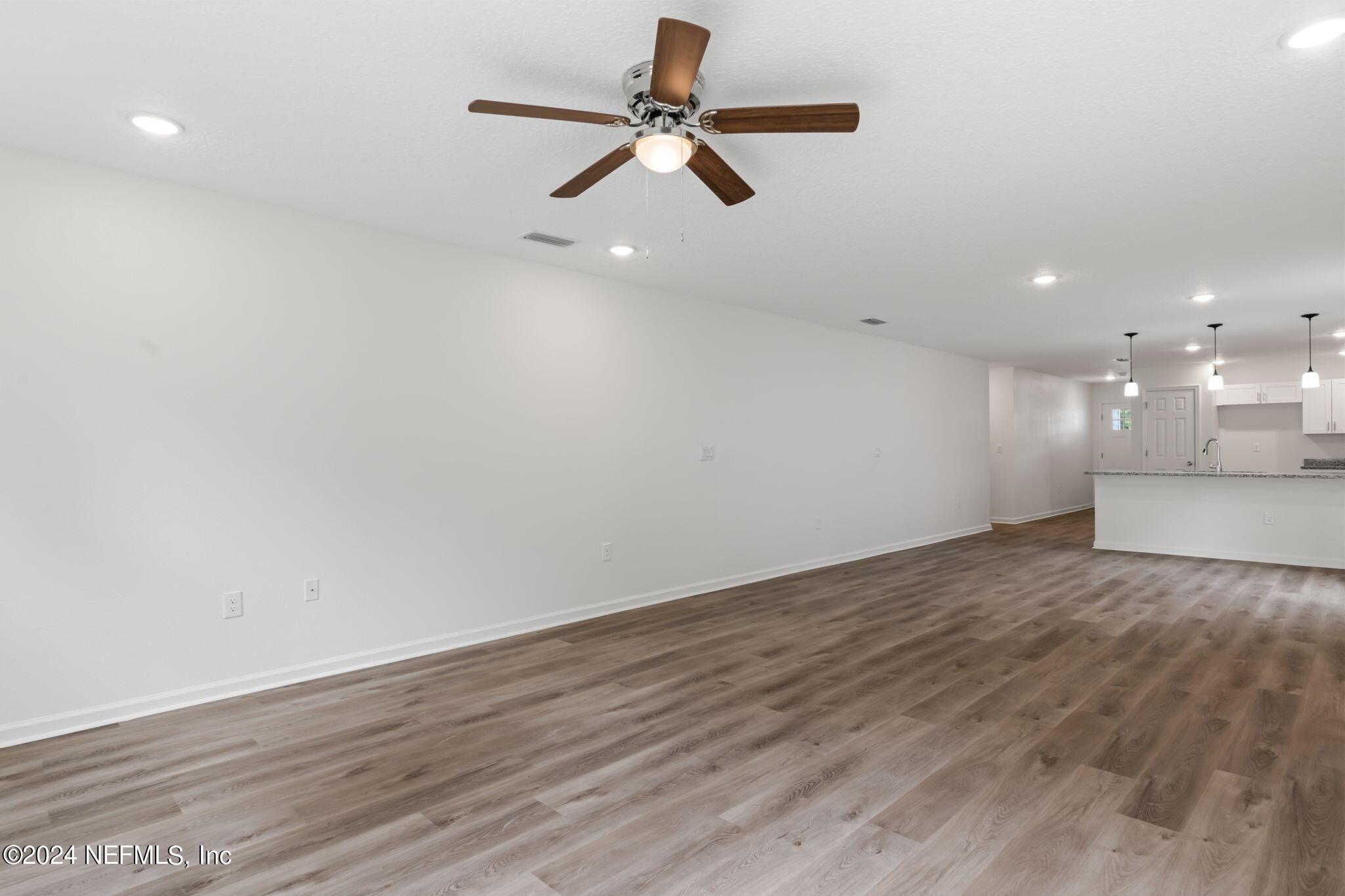 1014 Floyd Street Fleming Island, FL 32003 - Photo 21 of 48 a view of empty room with wooden floor