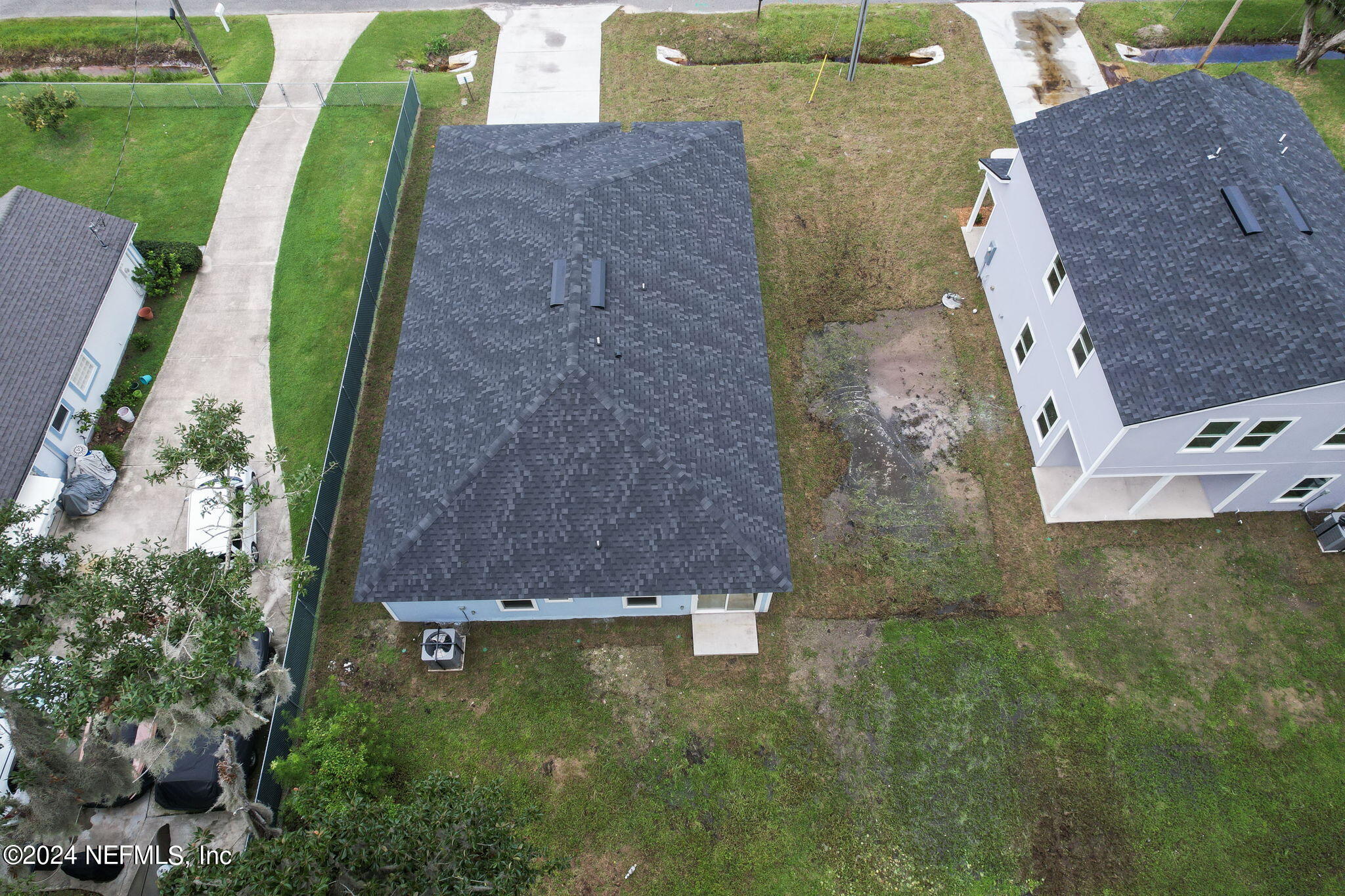 1014 Floyd Street Fleming Island, FL 32003 - Photo 41 of 48 an aerial view of a house with a yard