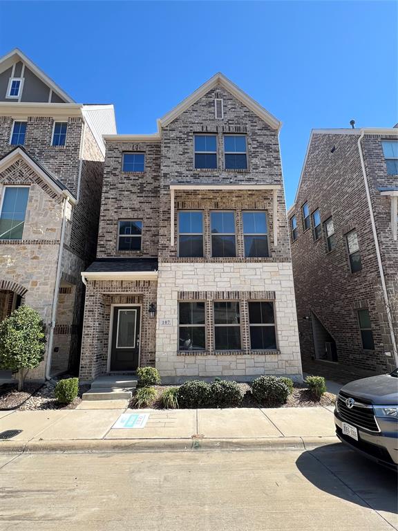 107 Peach Orchard Lane Euless, TX 76040 - Photo 1 of 9 a front view of a building