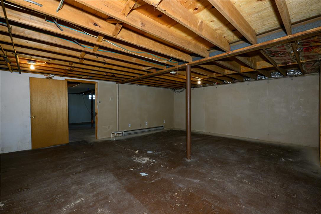 1644 9th Street Bethlehem, PA 18020 - Photo 17 of 27 A spacious, unfinished basement offers endless potential for customization and additional living space.