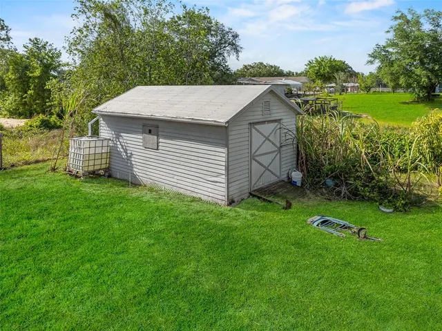a view of a backyard with a garden