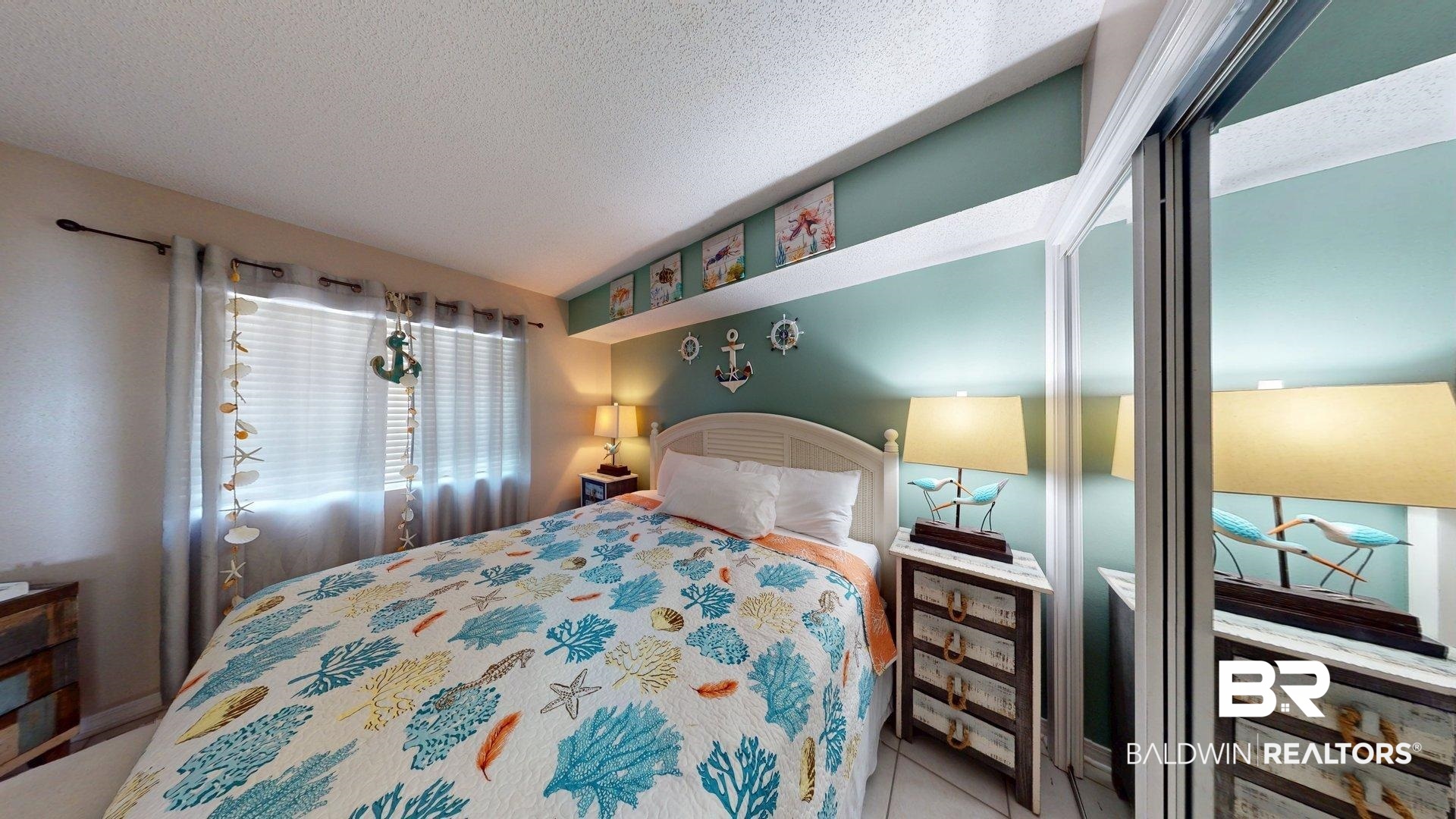 645 Plantation Road, Unit 6503 Gulf Shores, AL 36542 - Photo 50 of 53 Tiled bedroom featuring a textured ceiling