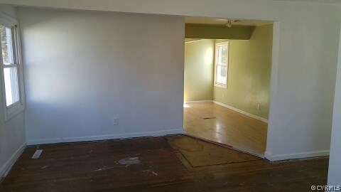 25 Warner Road Hampton, VA 23666 - Photo 3 of 11 an empty room with windows