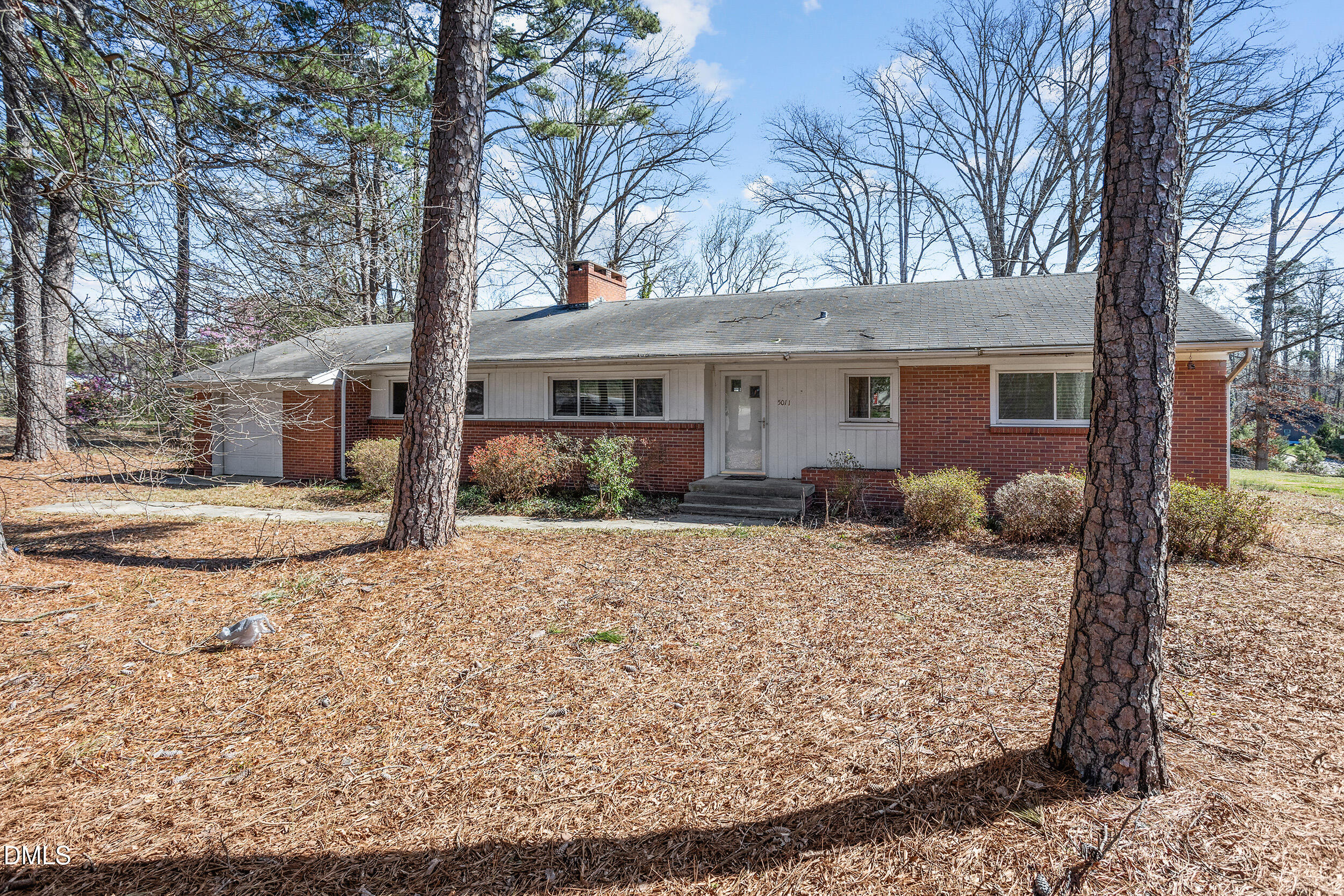 5011 Old Stage Road Raleigh, NC 27603 - Photo 2 of 29 a front view of a house with a yard covered in snow