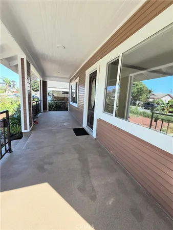 a view of a house with a porch