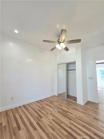 a view of a room with a flat screen tv