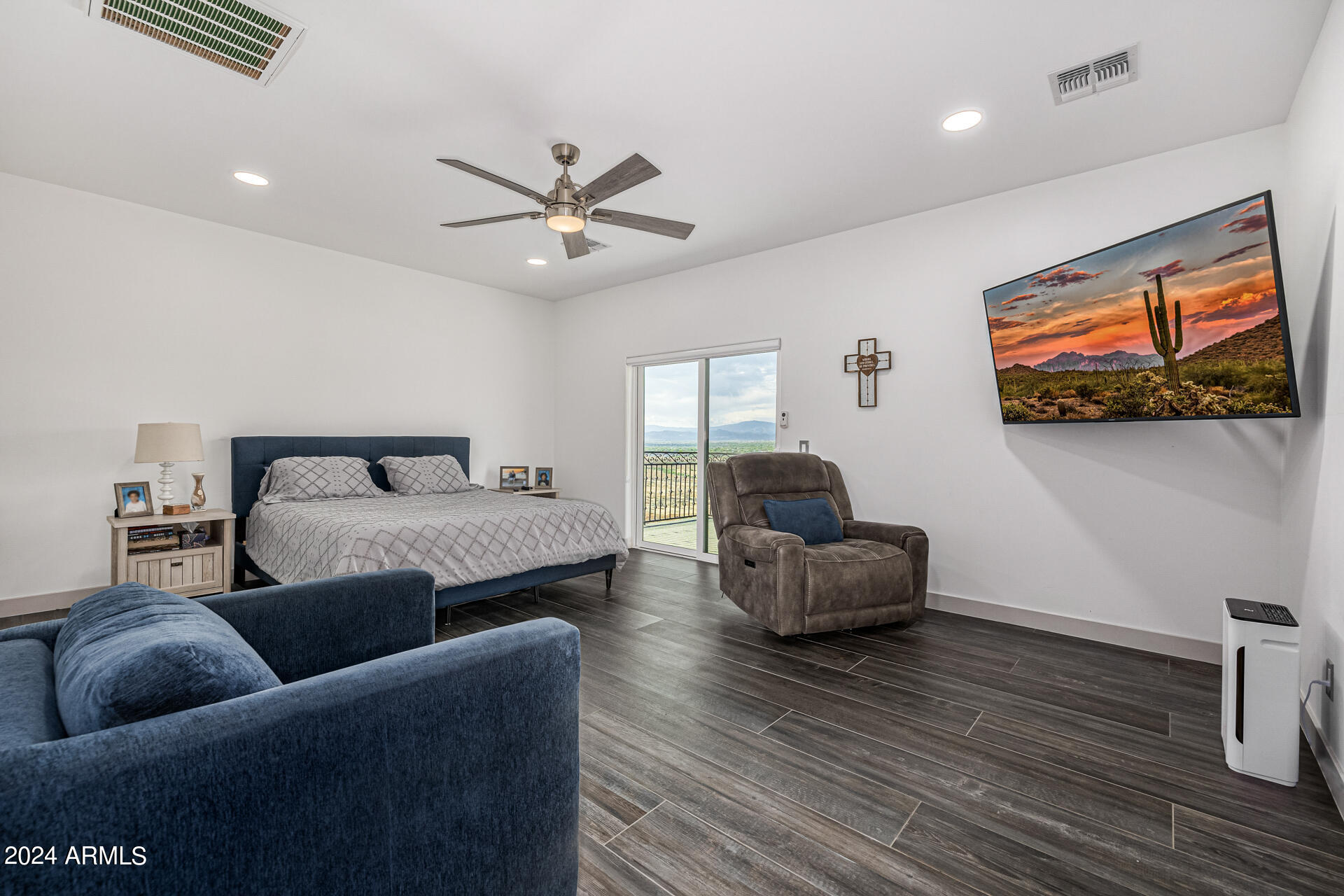 1829 West Cloud Road Phoenix, AZ 85086 - Photo 29 of 137 a living room with furniture and a flat screen tv