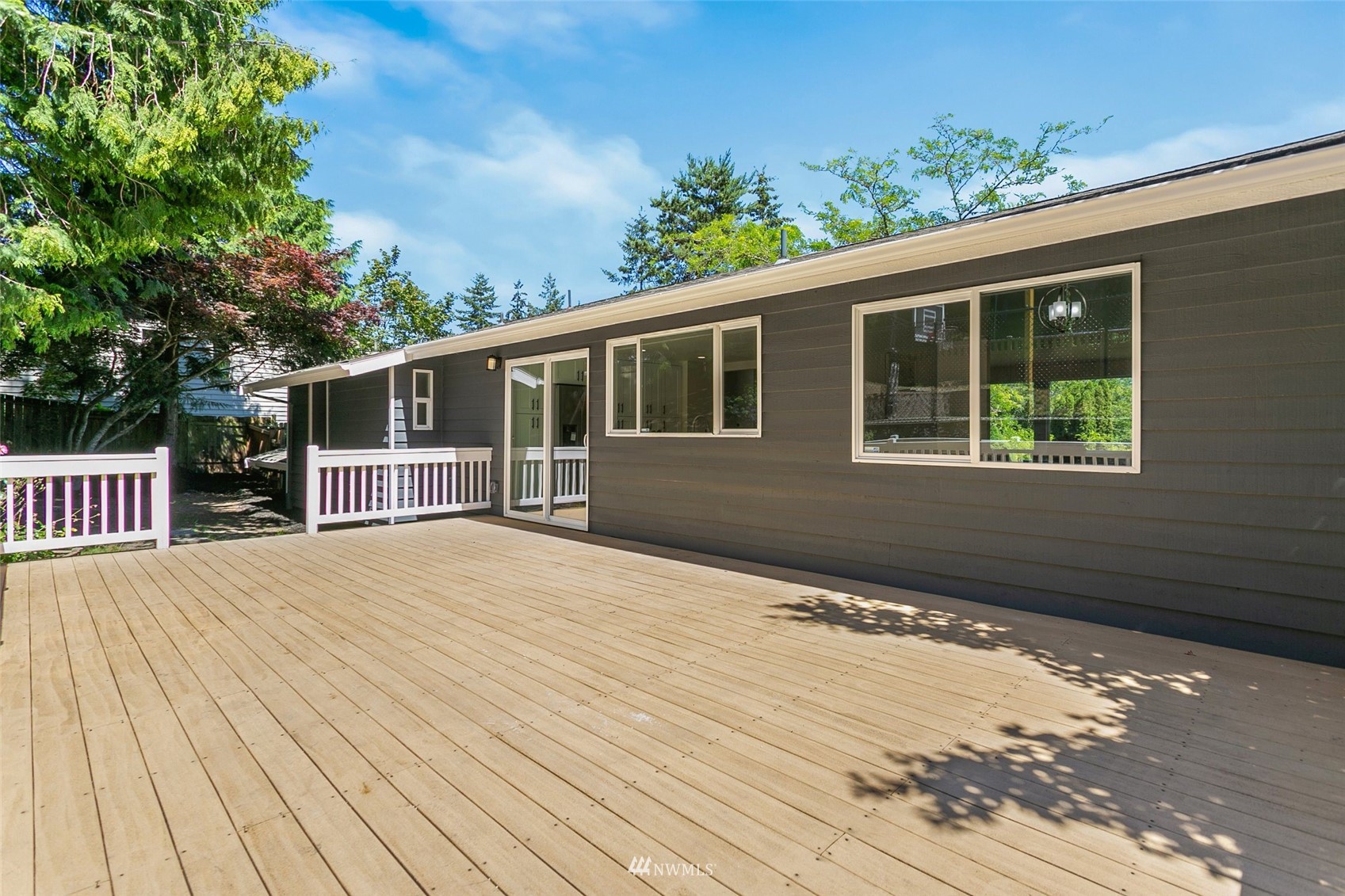 22130 5th Drive Southeast Bothell, WA 98021 - Photo 28 of 36 a house with trees in the background