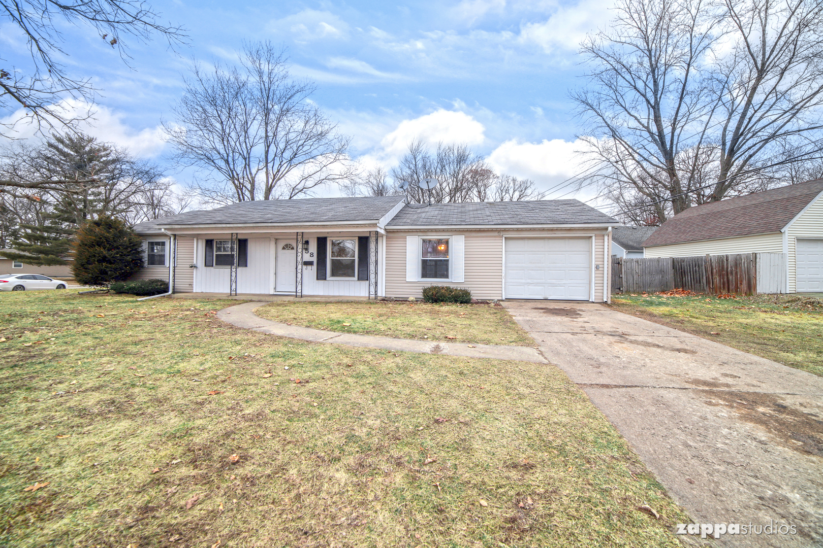 58 Long Beach Road Montgomery, IL 60538 - Photo 2 of 35 a front view of a house with a yard
