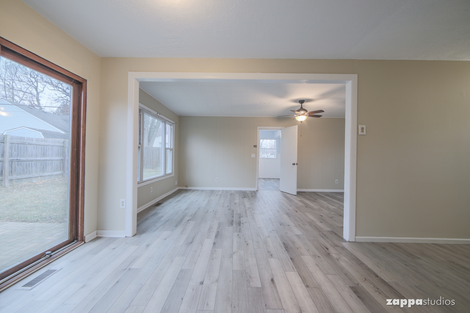 58 Long Beach Road Montgomery, IL 60538 - Photo 13 of 35 wooden floor in an empty room with a window