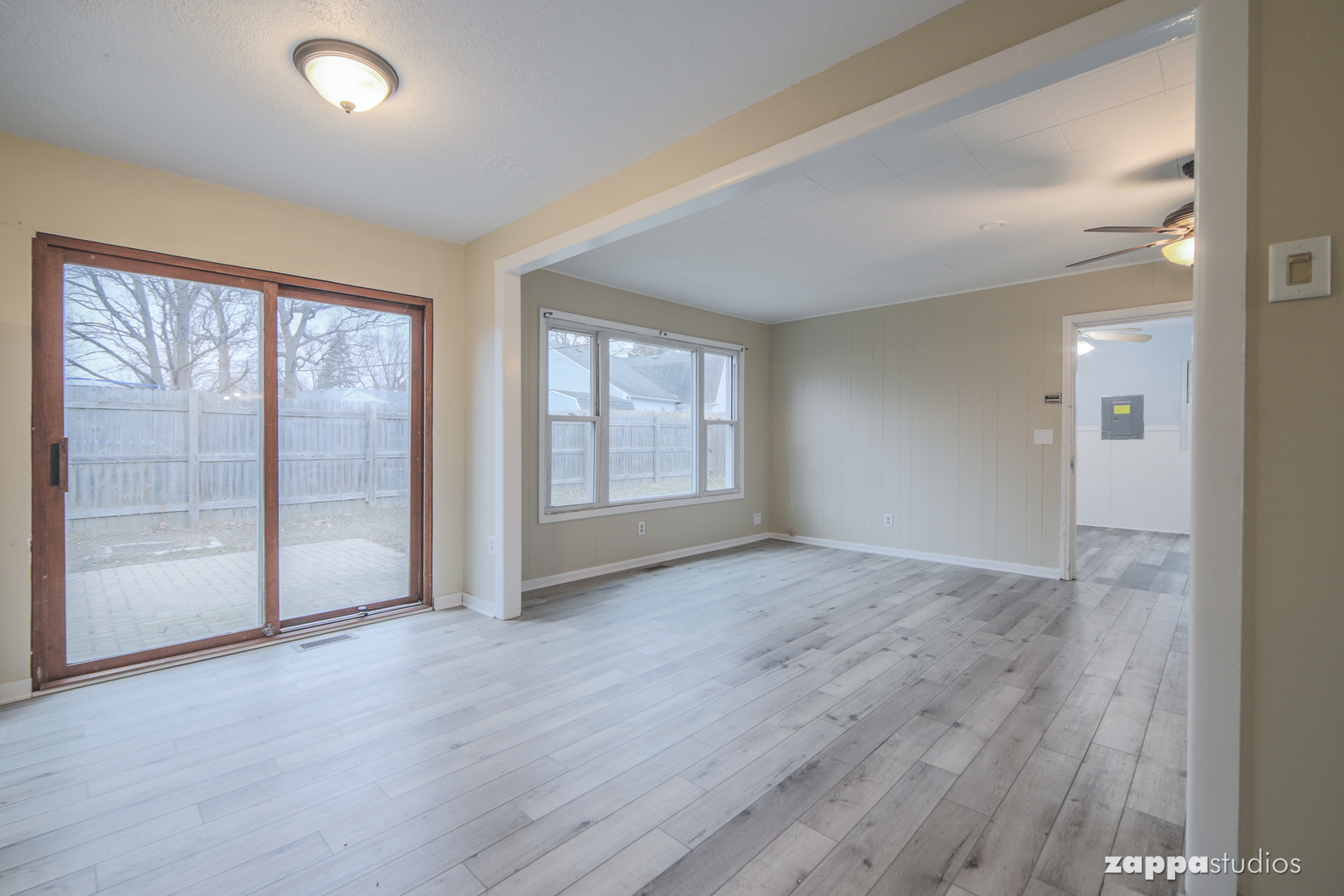 58 Long Beach Road Montgomery, IL 60538 - Photo 14 of 35 wooden floor in an empty room with a window