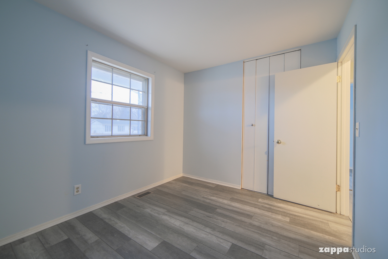58 Long Beach Road Montgomery, IL 60538 - Photo 24 of 35 a view of empty room with wooden floor