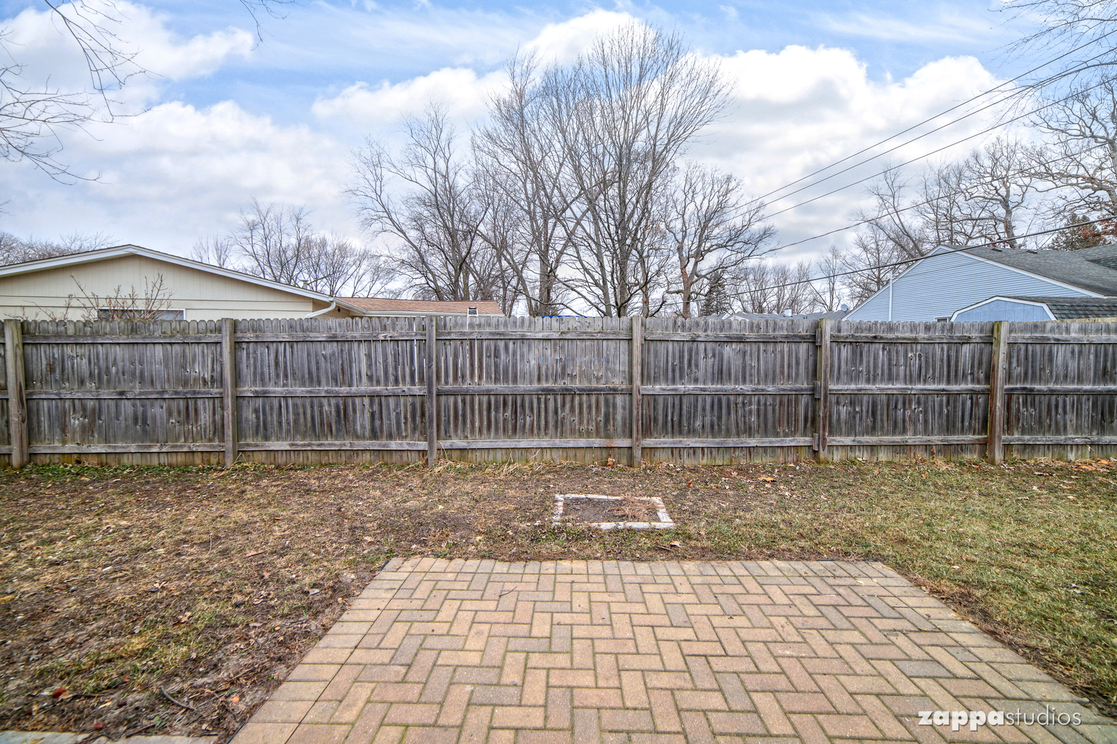 58 Long Beach Road Montgomery, IL 60538 - Photo 31 of 35 a view of a yard with a wooden fence