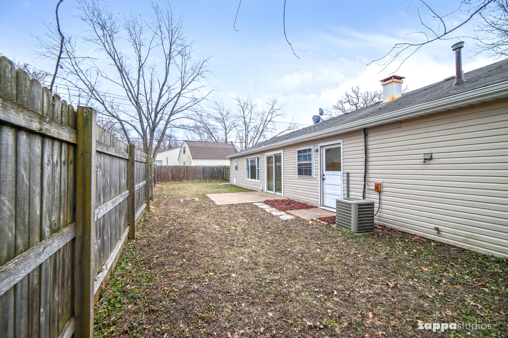 58 Long Beach Road Montgomery, IL 60538 - Photo 33 of 35 a view of house with a backyard