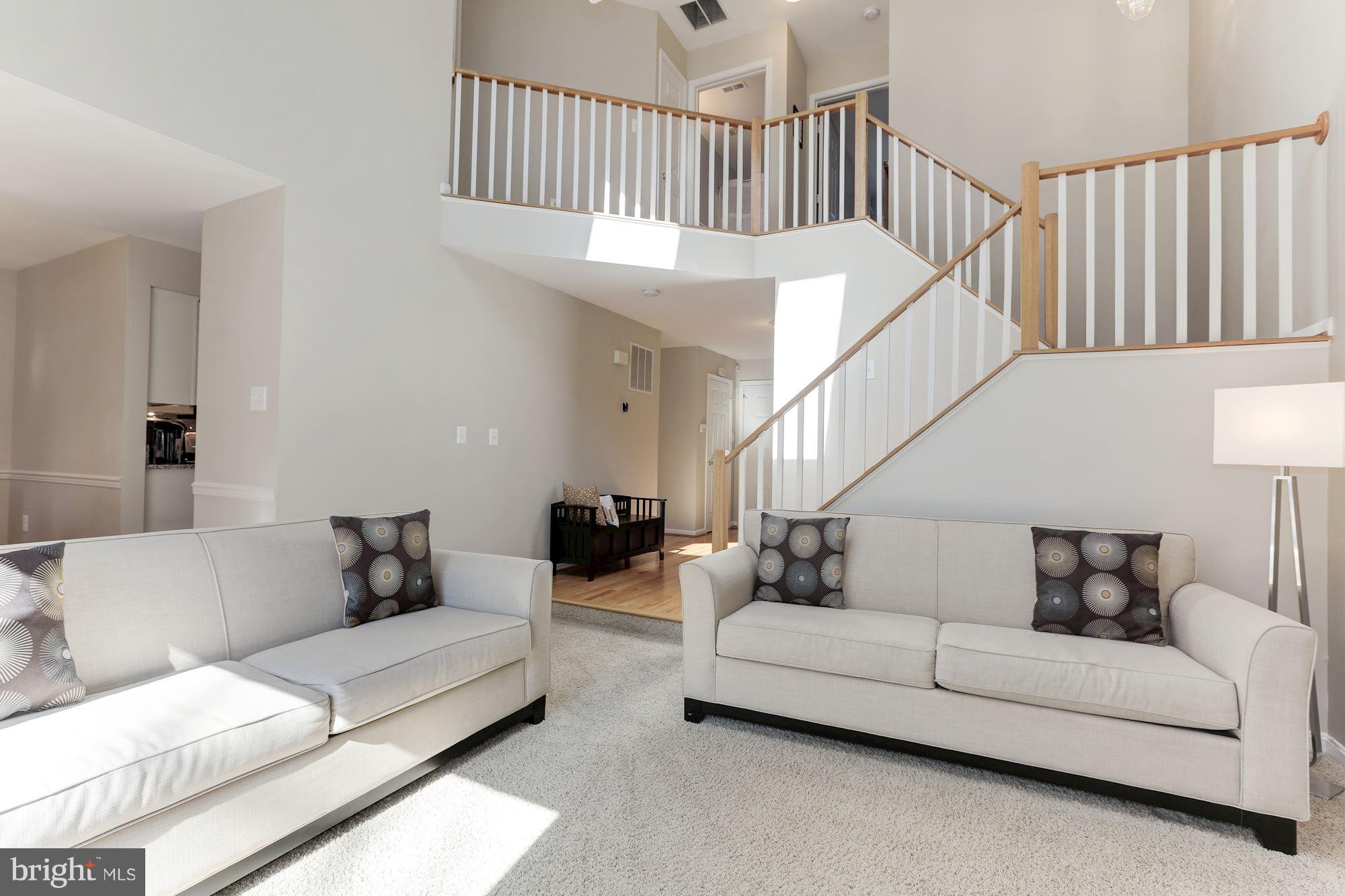 1322 Wedgewood Manor Way Reston, VA 20194 - Photo 6 of 30 a living room with furniture and a ceiling fan
