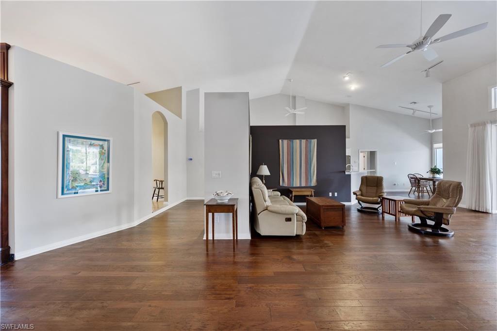 8992 Lely Island Circle Naples, FL 34113 - Photo 15 of 42 a living room with furniture window and a table