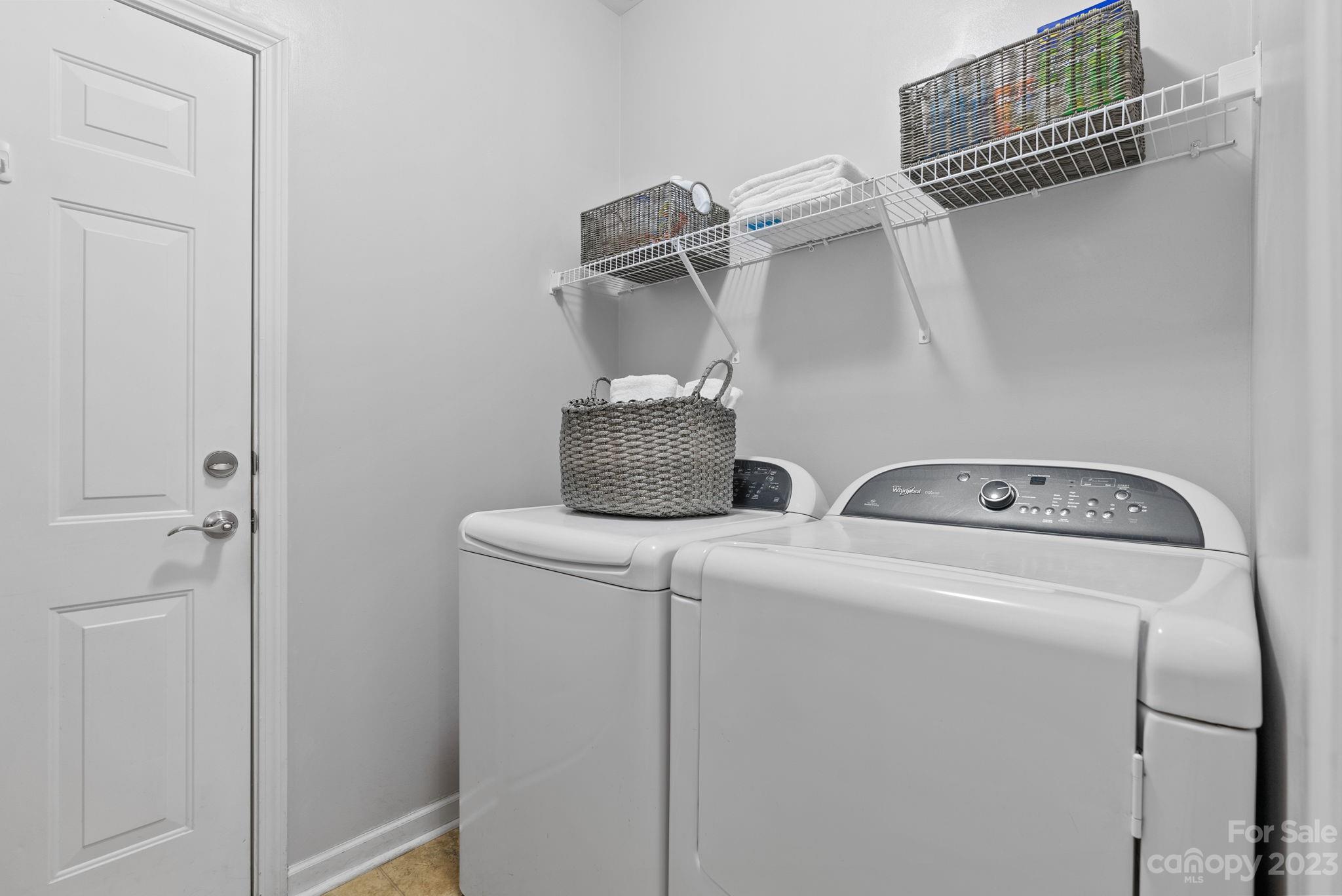 60 West Hiawassee Road Fletcher, NC 28732 - Photo 21 of 40 a utility room with dryer and washer