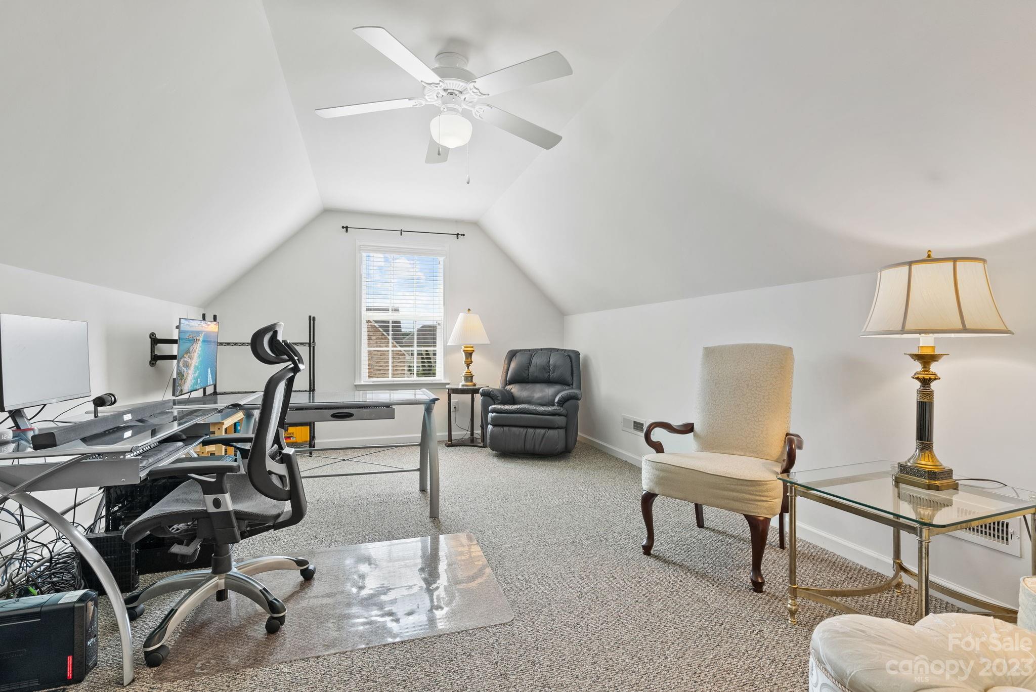 60 West Hiawassee Road Fletcher, NC 28732 - Photo 23 of 40 a living room with furniture gym equipment and a window