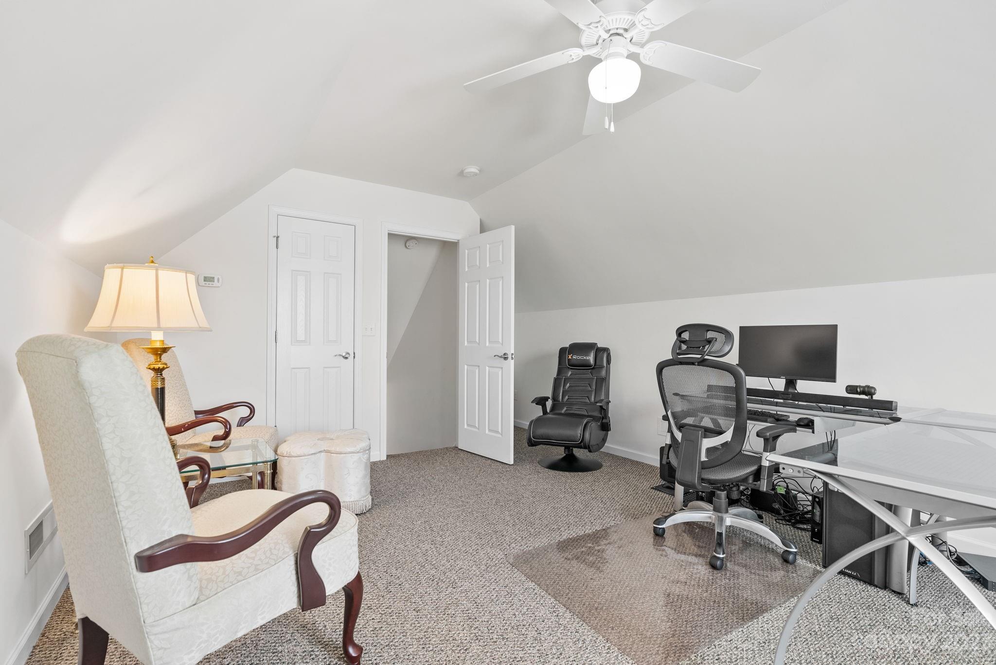 60 West Hiawassee Road Fletcher, NC 28732 - Photo 24 of 40 a view of a workspace with furniture and a window