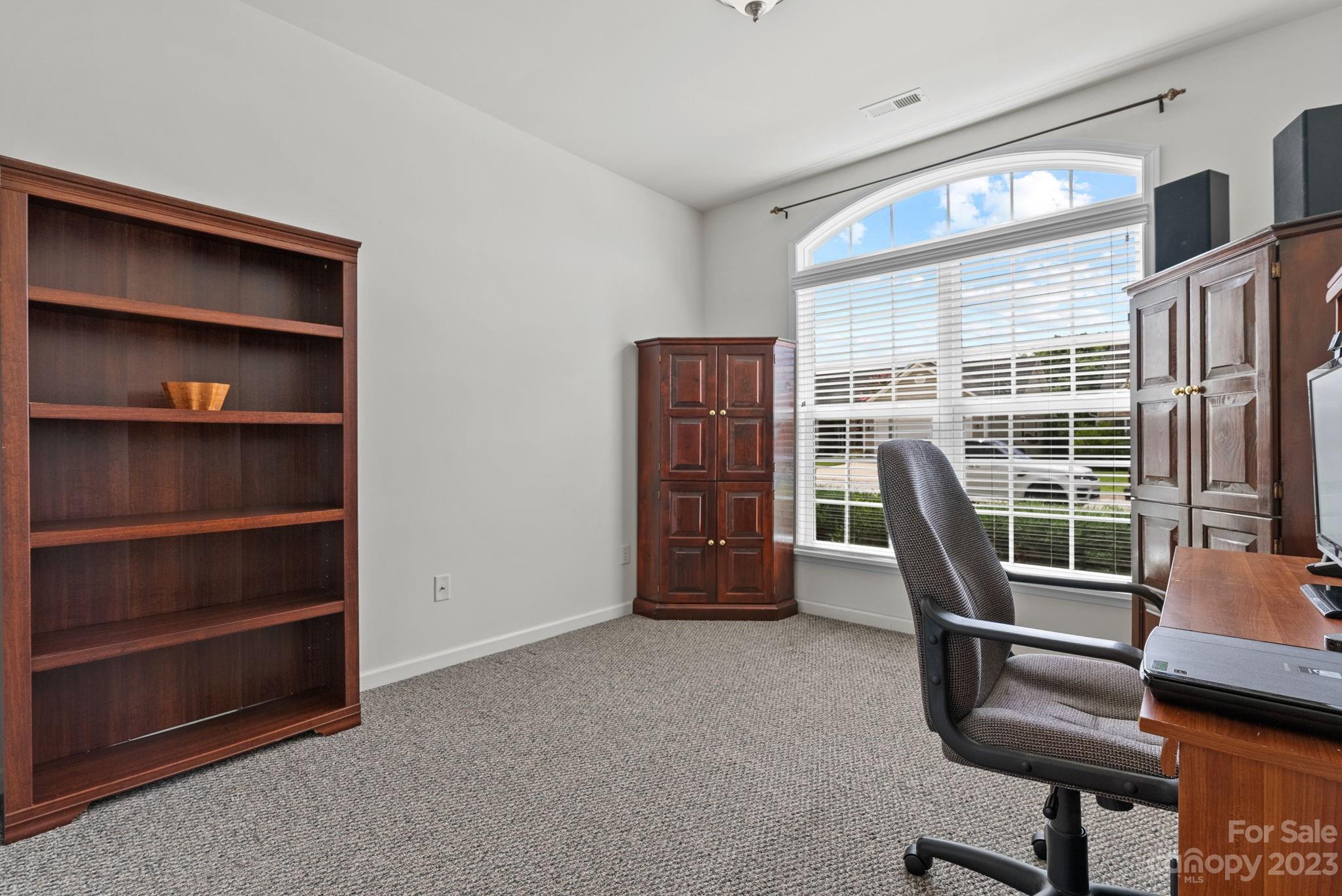 60 West Hiawassee Road Fletcher, NC 28732 - Photo 28 of 40 a view of a workspace with furniture and a window