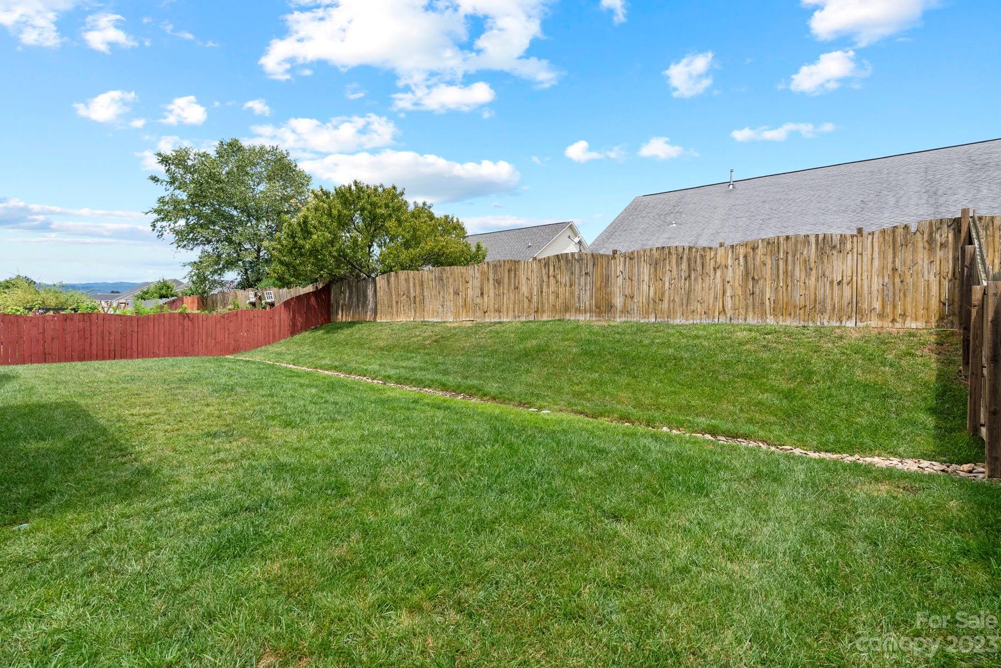 60 West Hiawassee Road Fletcher, NC 28732 - Photo 32 of 40 a view of a back yard