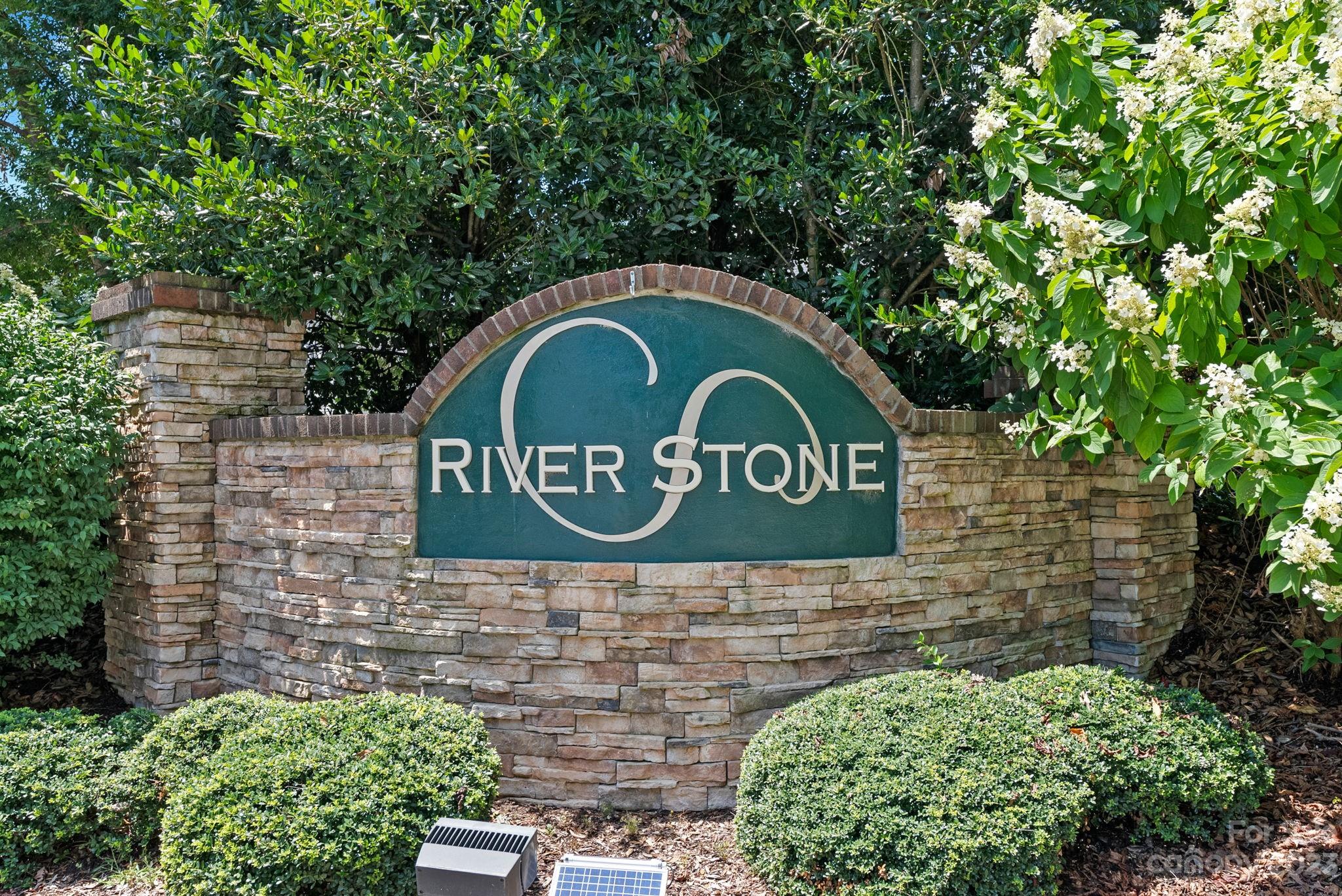 60 West Hiawassee Road Fletcher, NC 28732 - Photo 39 of 40 a brick building with a sign broad