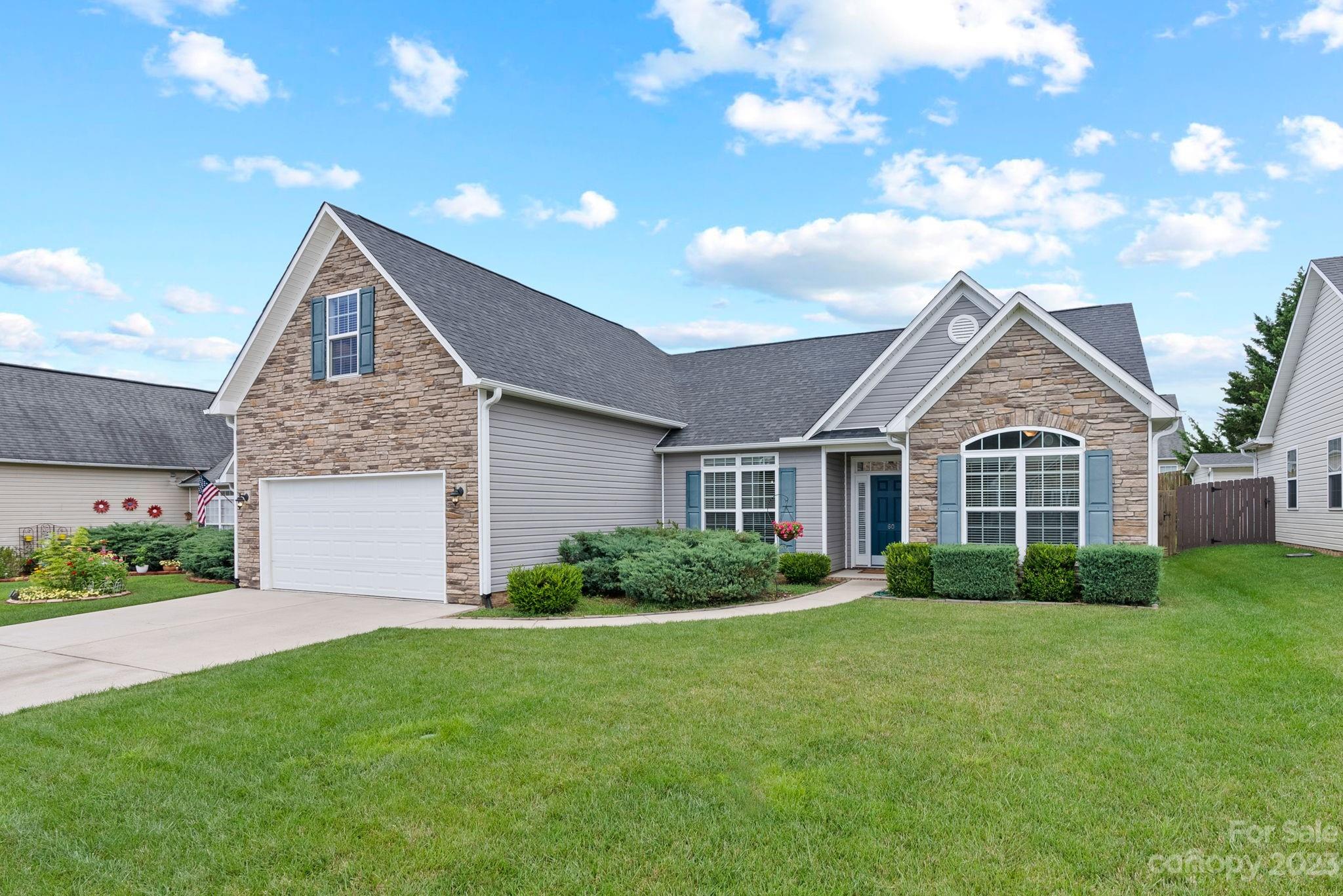 60 West Hiawassee Road Fletcher, NC 28732 - Photo 40 of 40 a front view of house with yard and green space