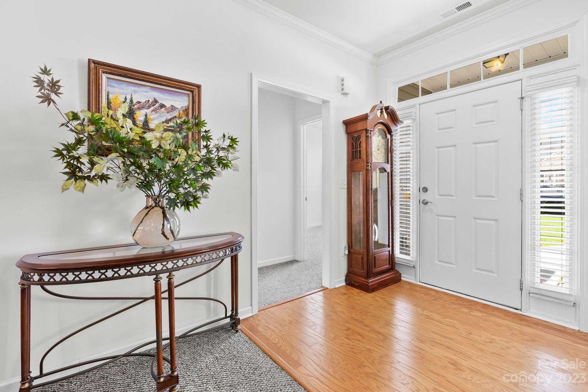60 West Hiawassee Road Fletcher, NC 28732 - Photo 6 of 40 a view of a hallway with a potted plant