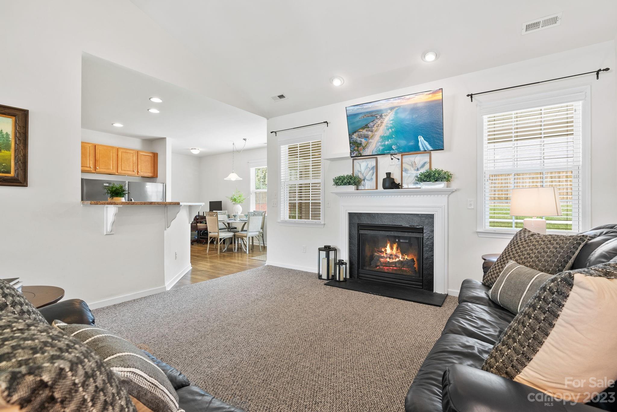60 West Hiawassee Road Fletcher, NC 28732 - Photo 7 of 40 a living room with furniture and a fireplace