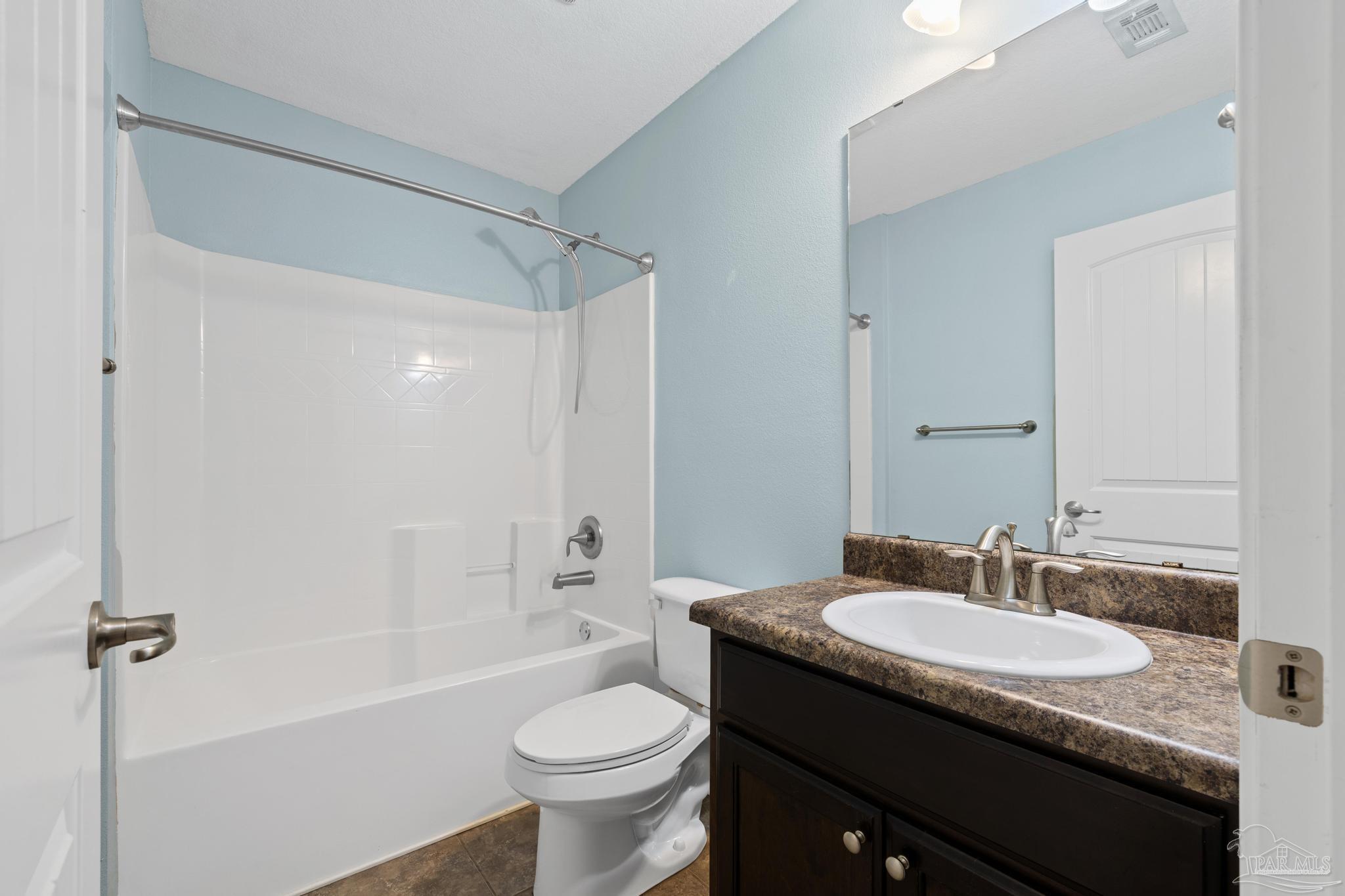4479 Fort Sumter Road Milton, FL 32583 - Photo 26 of 34 right off bedroom 4 for guest suite access