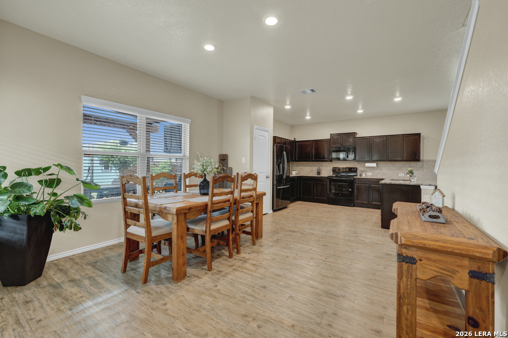 124 Field Ridge New Braunfels, TX 78130 - Photo 13 of 43 a view of a dining room with furniture