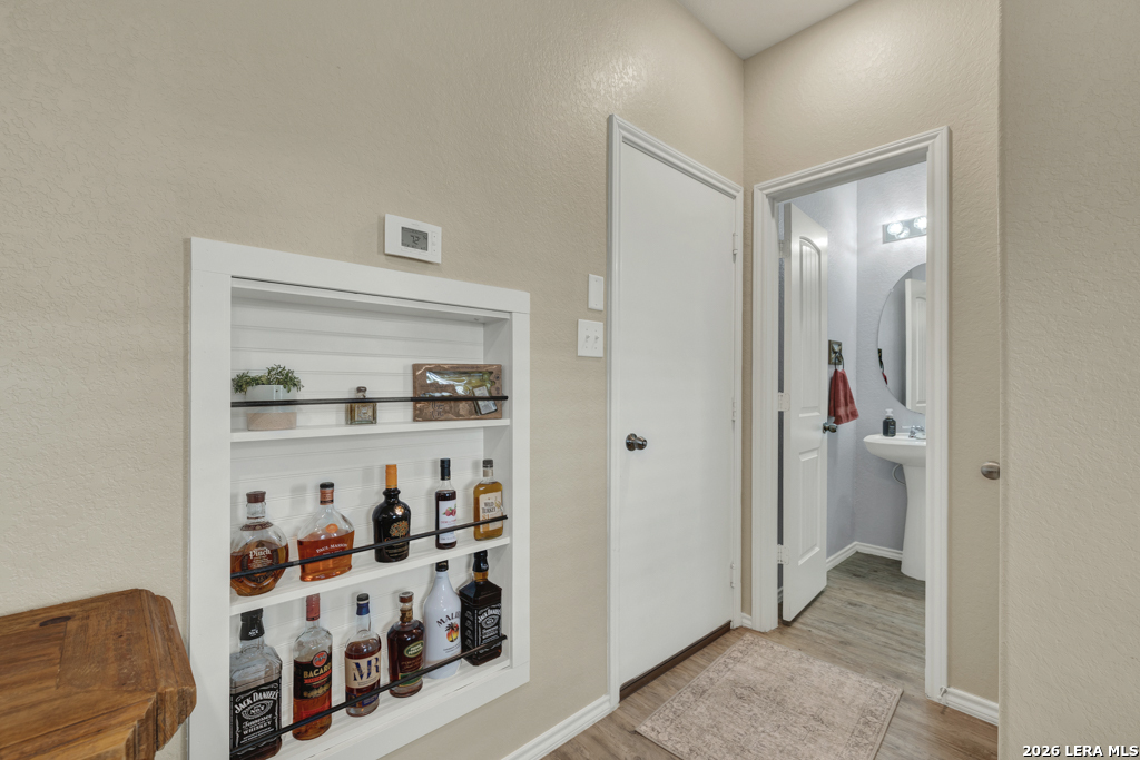 124 Field Ridge New Braunfels, TX 78130 - Photo 14 of 43 a view of a livingroom with wooden floor and closet