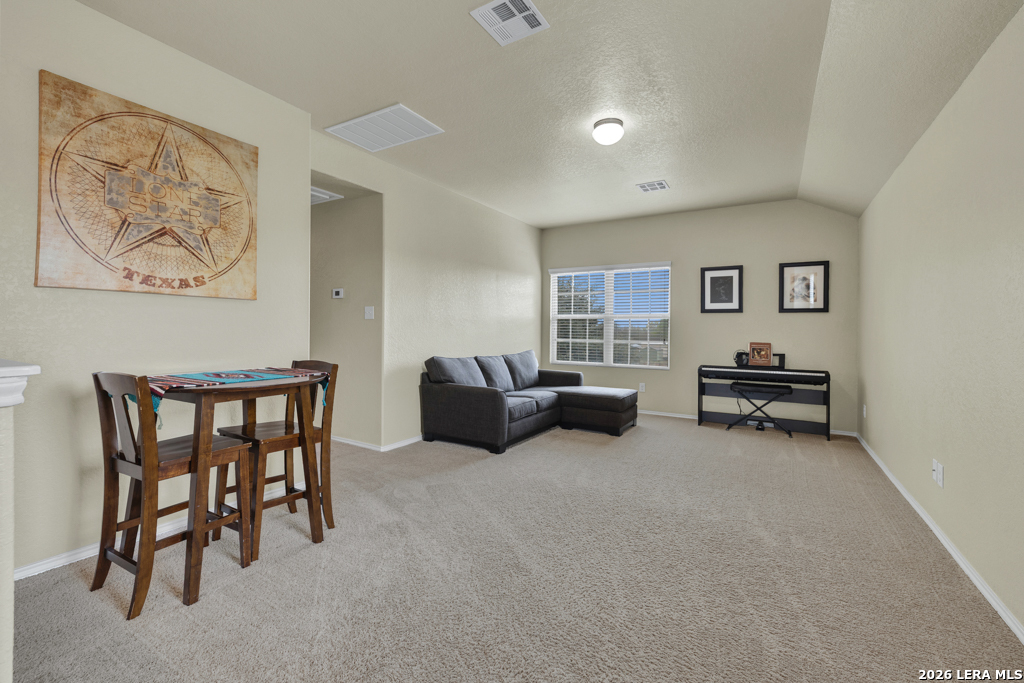 124 Field Ridge New Braunfels, TX 78130 - Photo 18 of 43 a living room with furniture and a piano