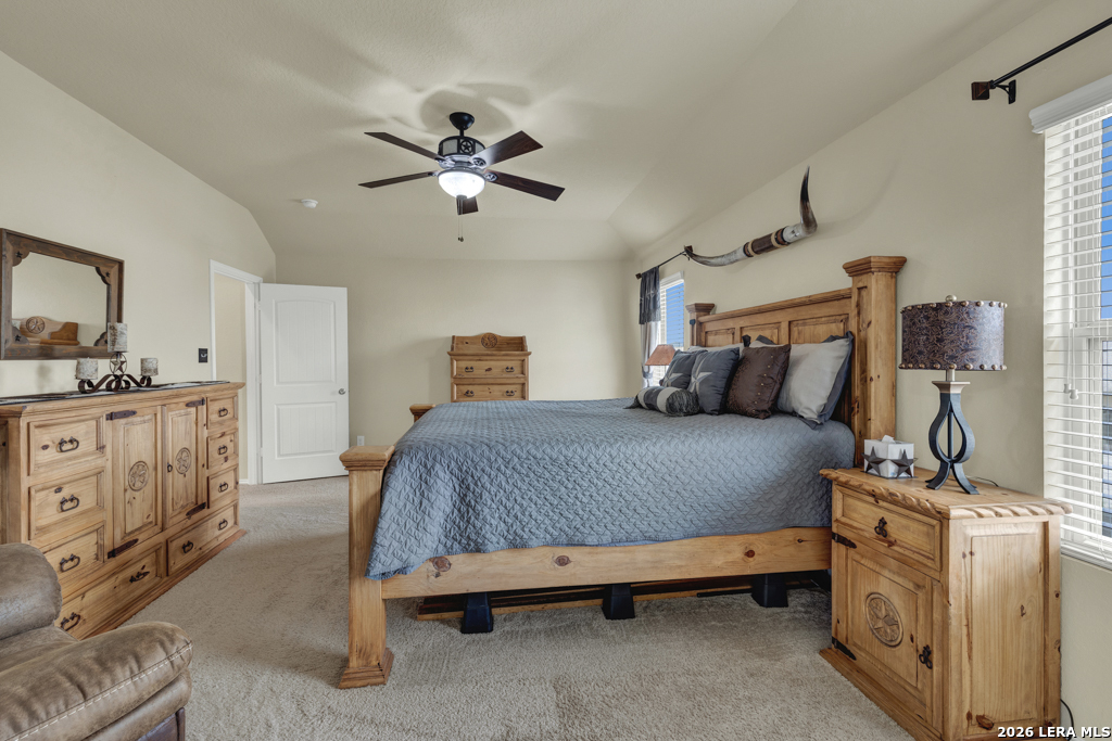 124 Field Ridge New Braunfels, TX 78130 - Photo 21 of 43 a bedroom with a bed and cabinets