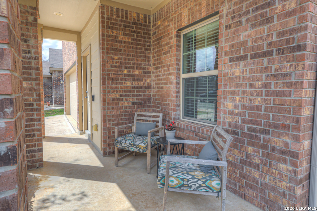 124 Field Ridge New Braunfels, TX 78130 - Photo 3 of 43 a view of a patio with a table and chairs