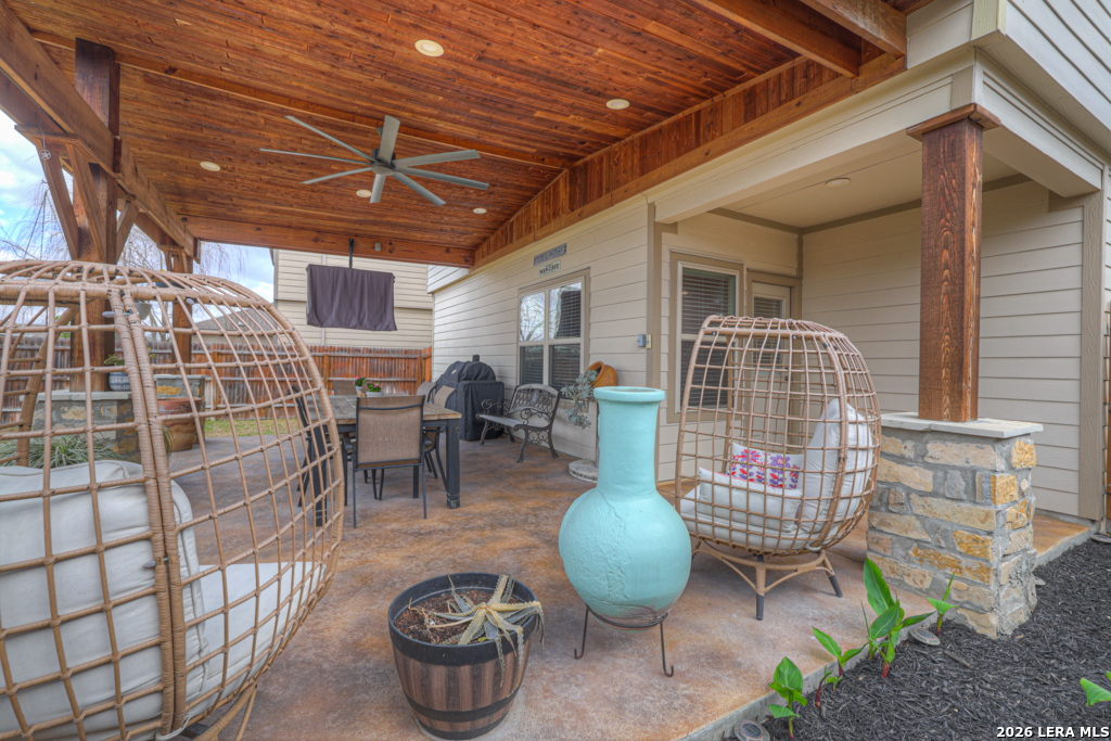 124 Field Ridge New Braunfels, TX 78130 - Photo 32 of 43 a living room with couches chairs and wooden floor