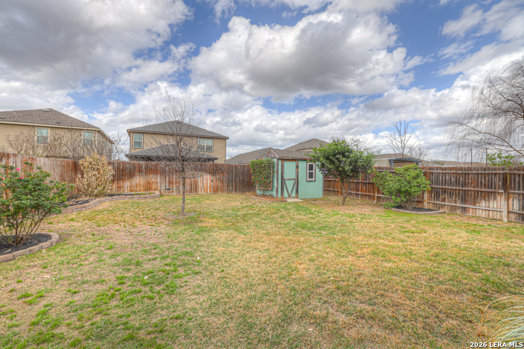 124 Field Ridge New Braunfels, TX 78130 - Photo 38 of 43 a view of a house with a yard and sitting area