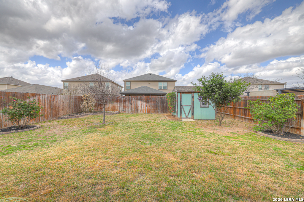 124 Field Ridge New Braunfels, TX 78130 - Photo 39 of 43 a view of a house with a yard and potted plants