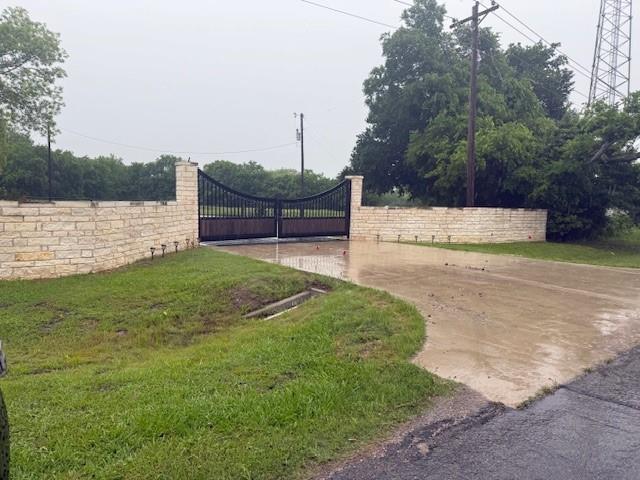 9015 Highway 69 Bells, TX 75414 - Photo 7 of 21 View of street featuring a gate
