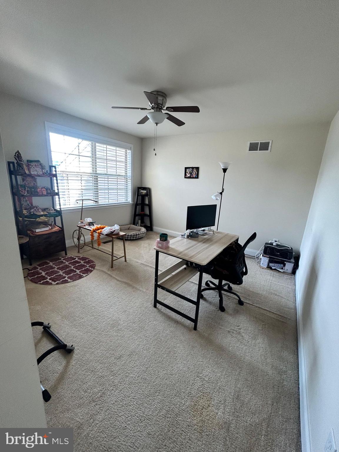3049 Rainer Road Chester Springs, PA 19425 - Photo 11 of 19 a living room with furniture and a large window