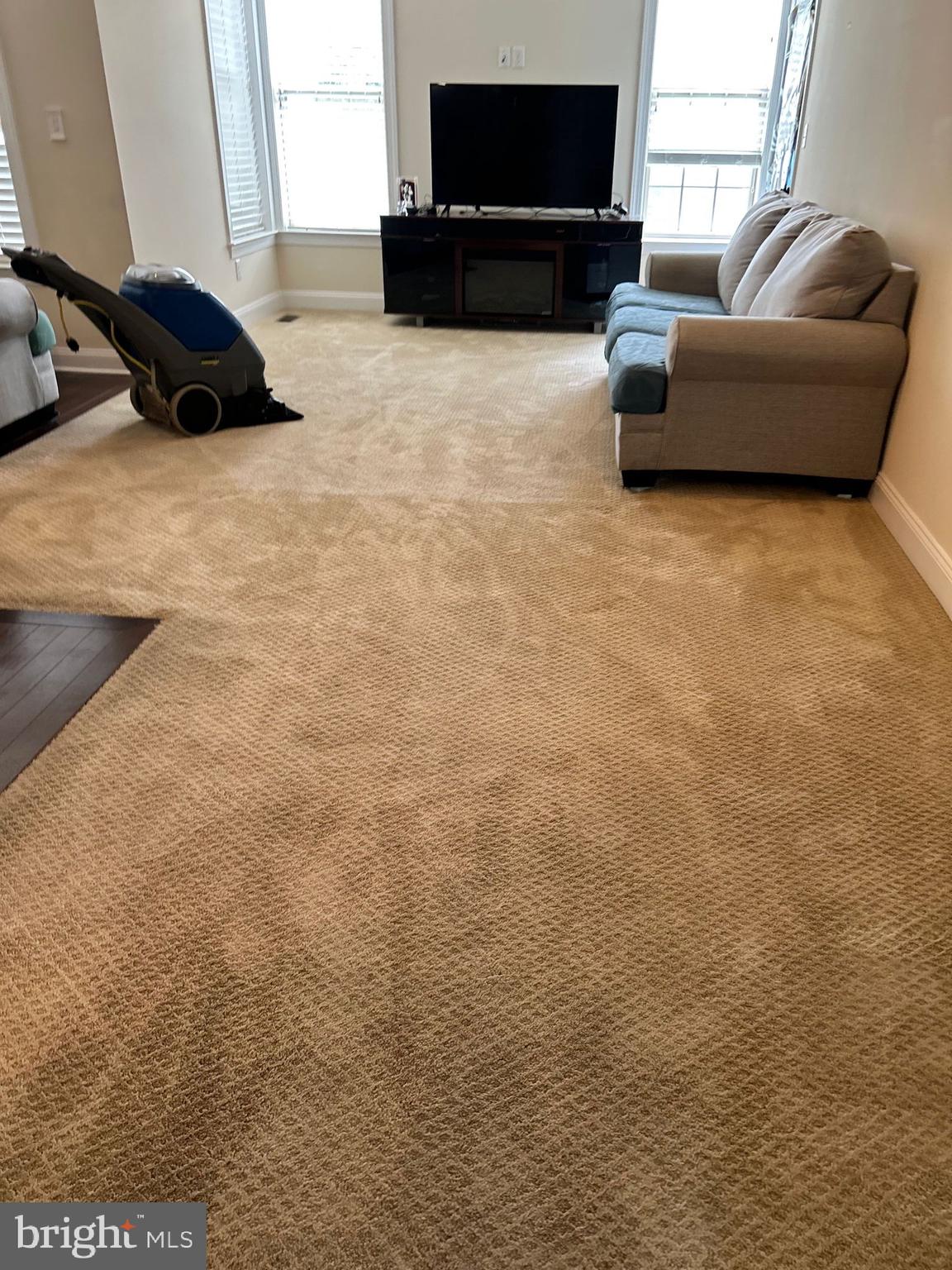3049 Rainer Road Chester Springs, PA 19425 - Photo 4 of 19 a living room with furniture and a flat screen tv