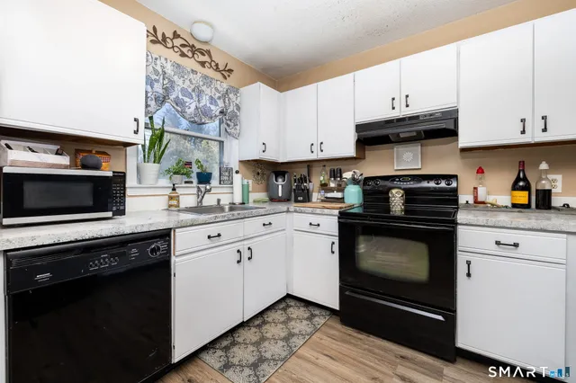 a bathroom with a shower and a toilet