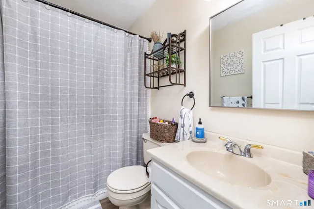 a bed room with furniture and a window