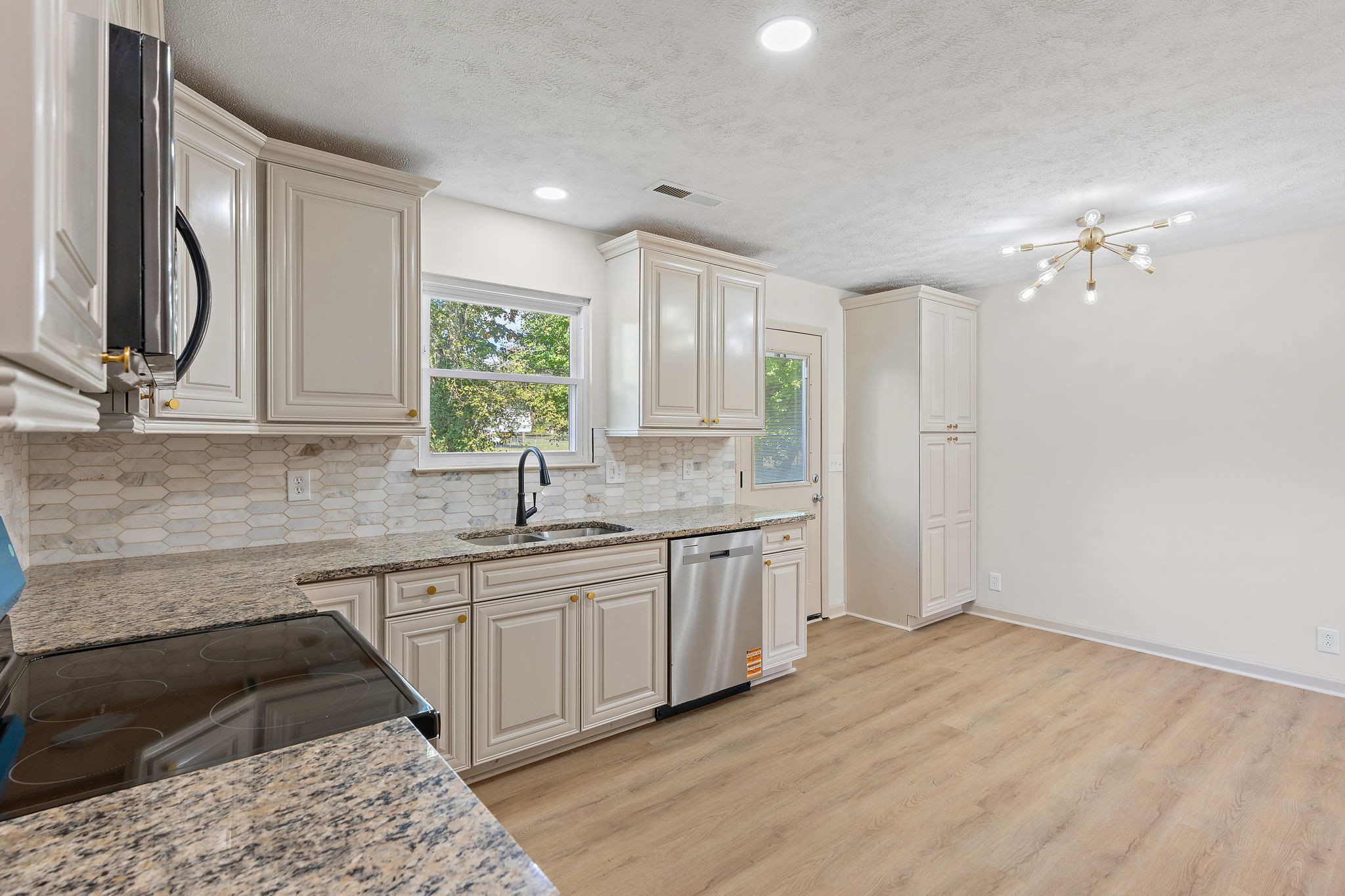 583 Parsons Road Christiana, TN 37037 - Photo 13 of 35 a kitchen with a sink cabinets and window