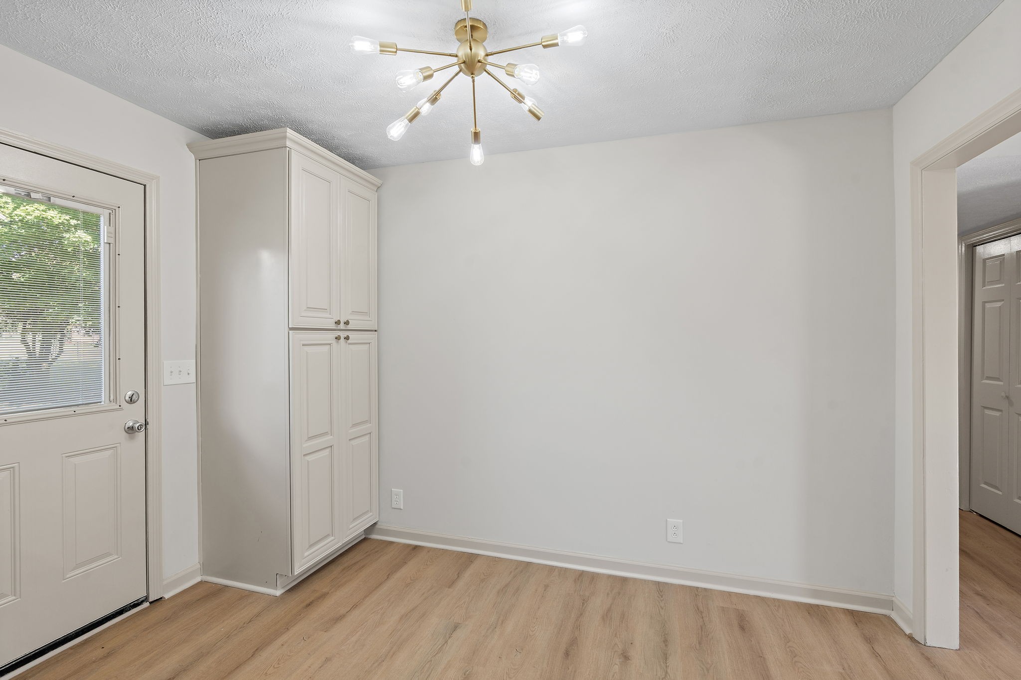 583 Parsons Road Christiana, TN 37037 - Photo 14 of 35 wooden floor in an empty room with a window