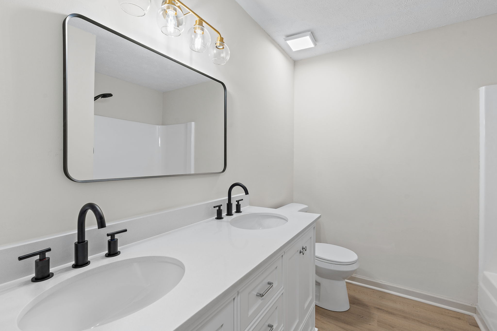 583 Parsons Road Christiana, TN 37037 - Photo 16 of 35 a bathroom with a toilet sink and mirror