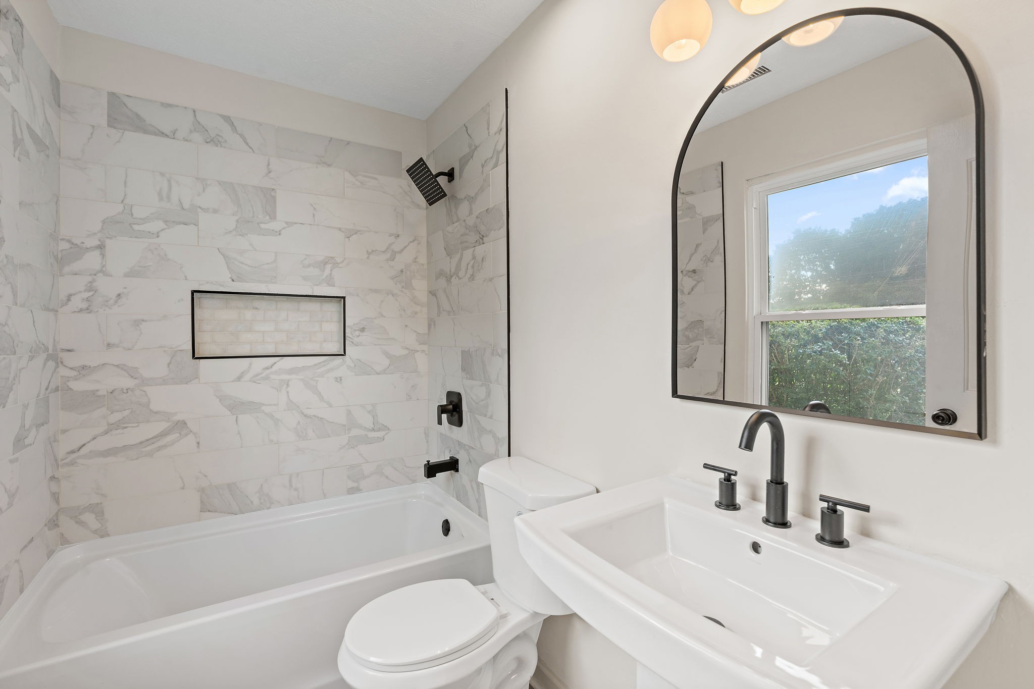 583 Parsons Road Christiana, TN 37037 - Photo 26 of 35 a bathroom with a sink mirror bathtub and toilet