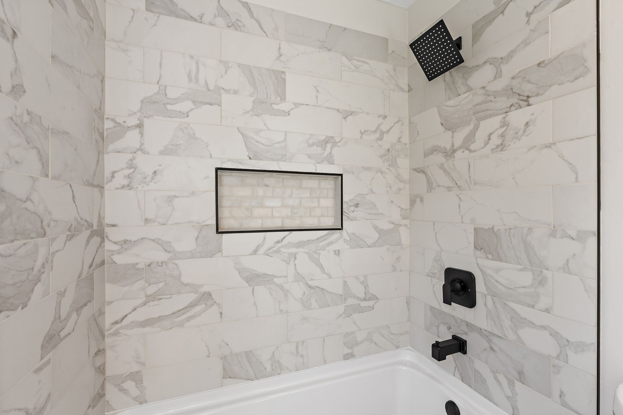 583 Parsons Road Christiana, TN 37037 - Photo 27 of 35 a bathroom with a bathtub and a shower