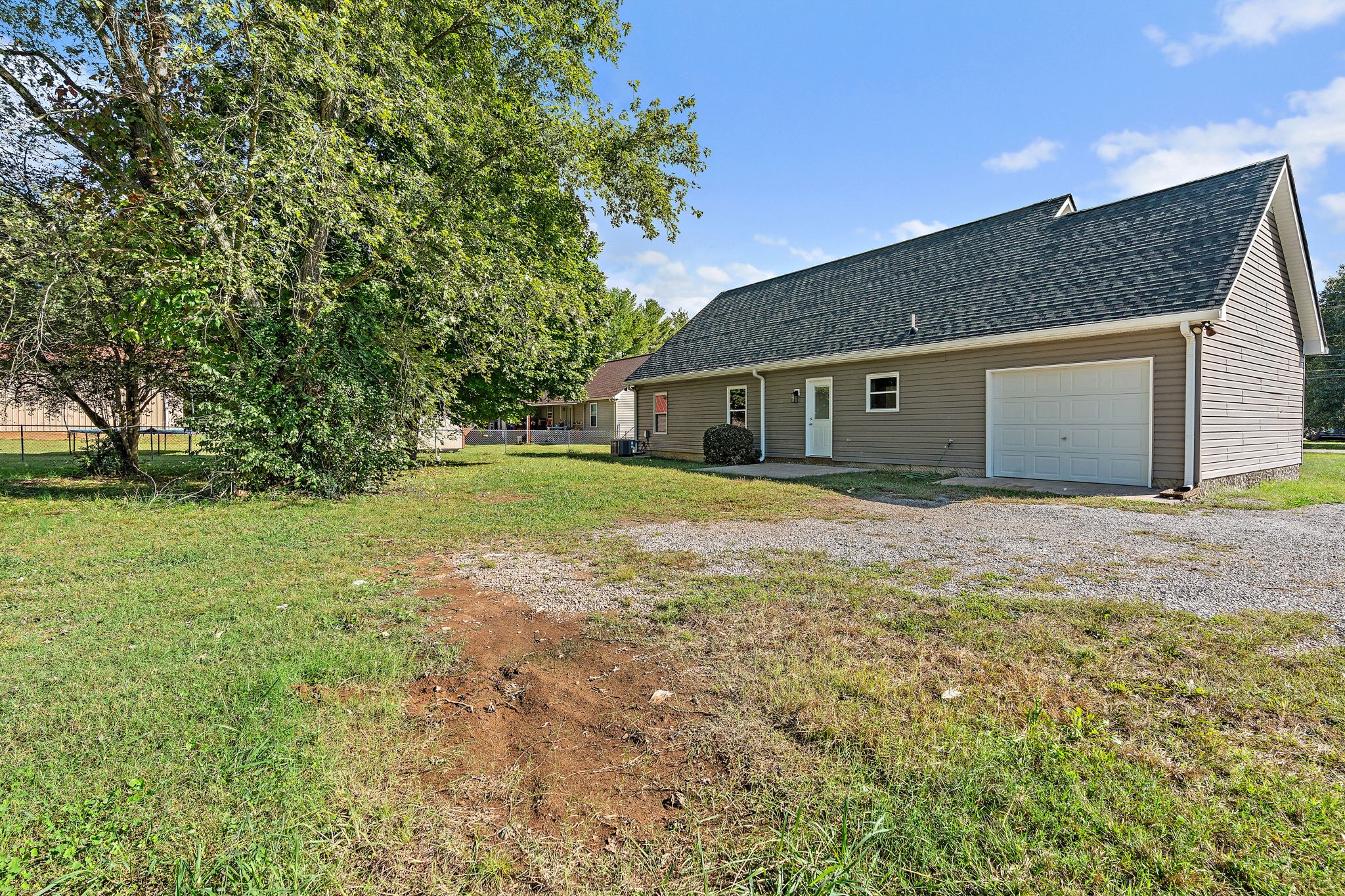 583 Parsons Road Christiana, TN 37037 - Photo 31 of 35 a front view of house with yard and trees